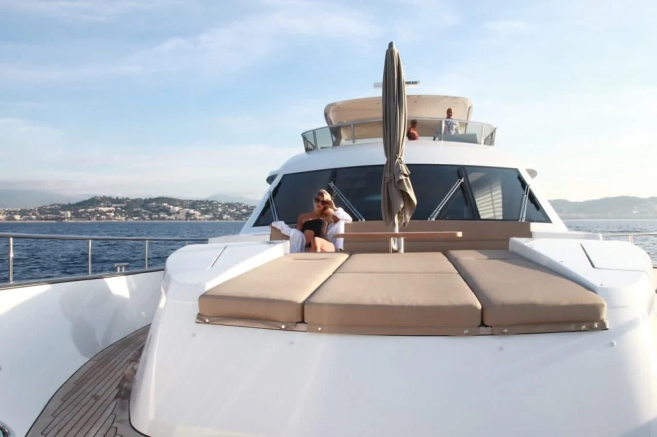 a person sitting on a boat aboard ORION Yacht for Sale