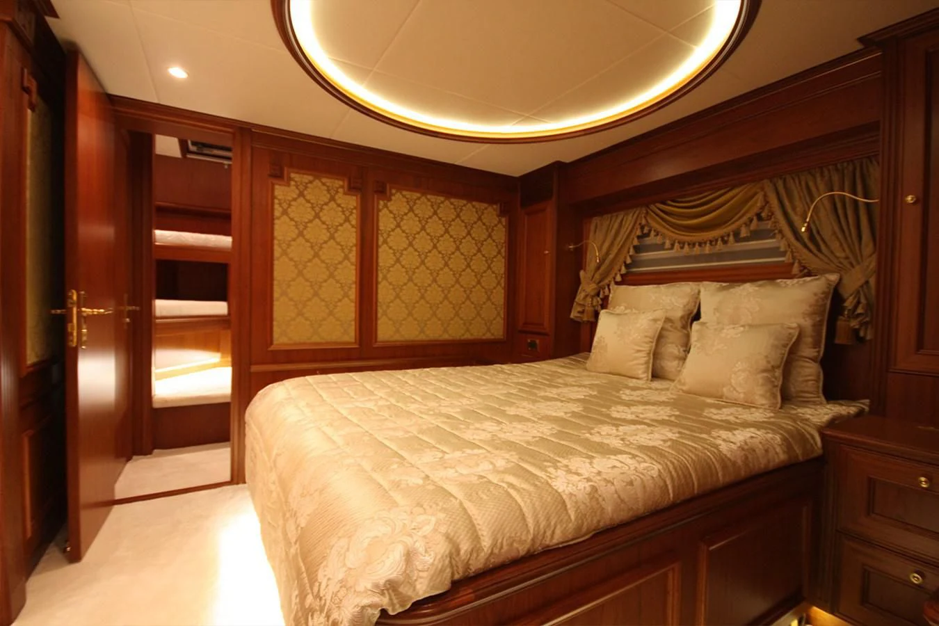 a large bed in a room aboard ORION Yacht for Sale