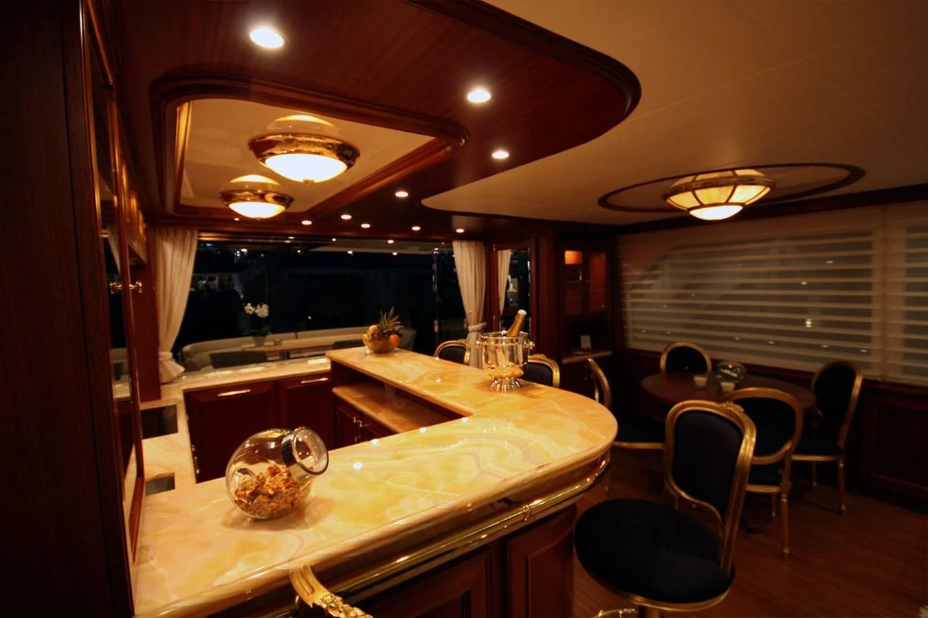 a room with a table and chairs aboard ORION Yacht for Sale