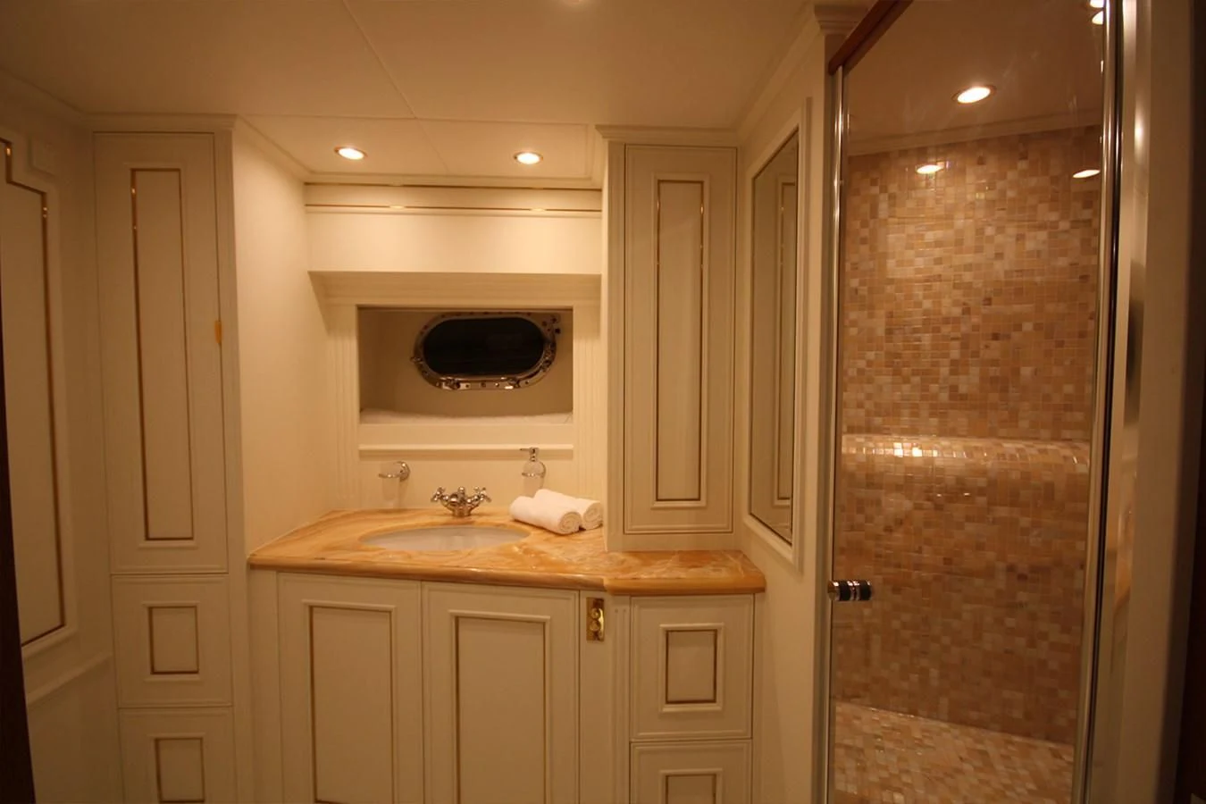 a bathroom with a sink and a microwave oven aboard ORION Yacht for Sale