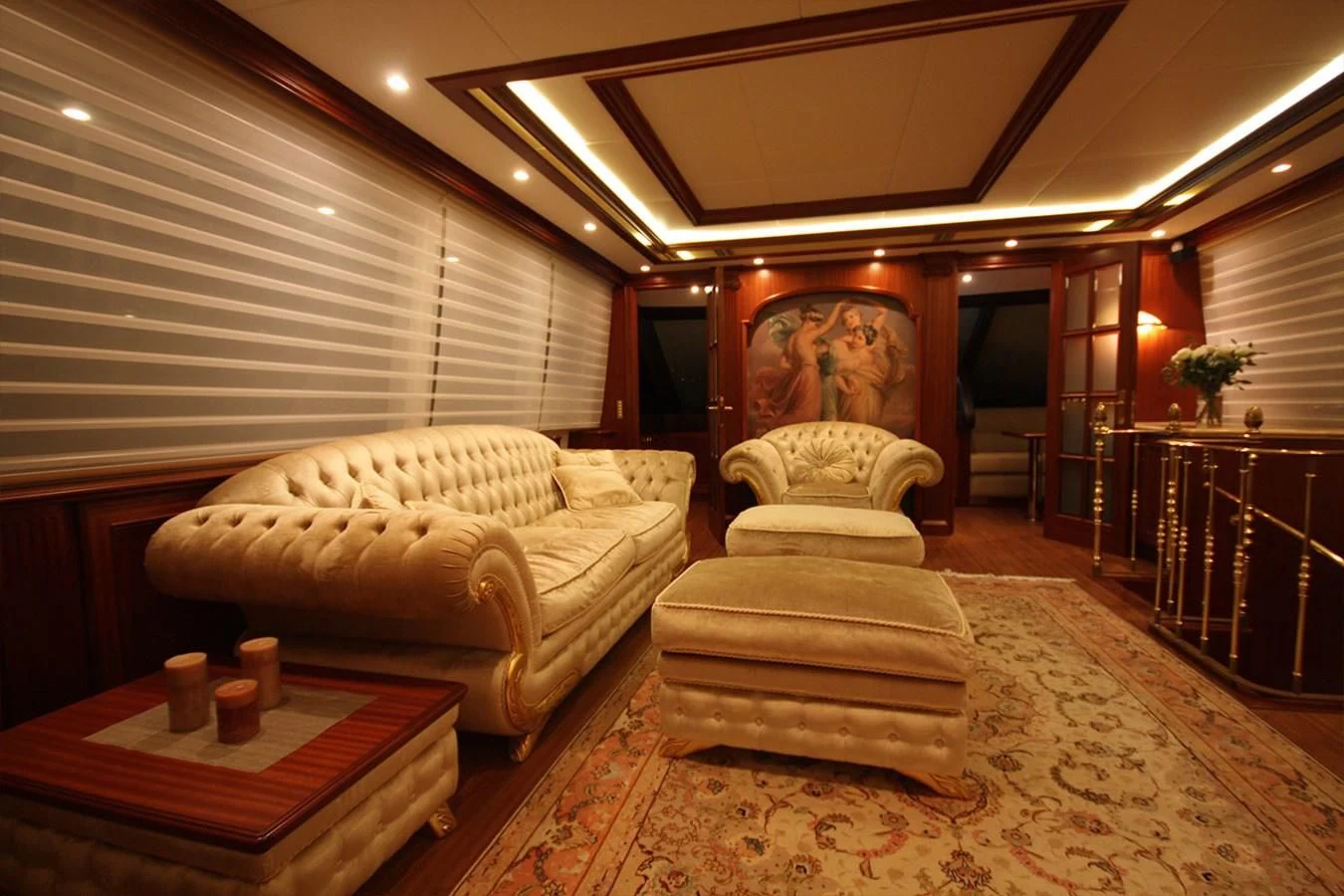 a living room with a large painting aboard ORION Yacht for Sale