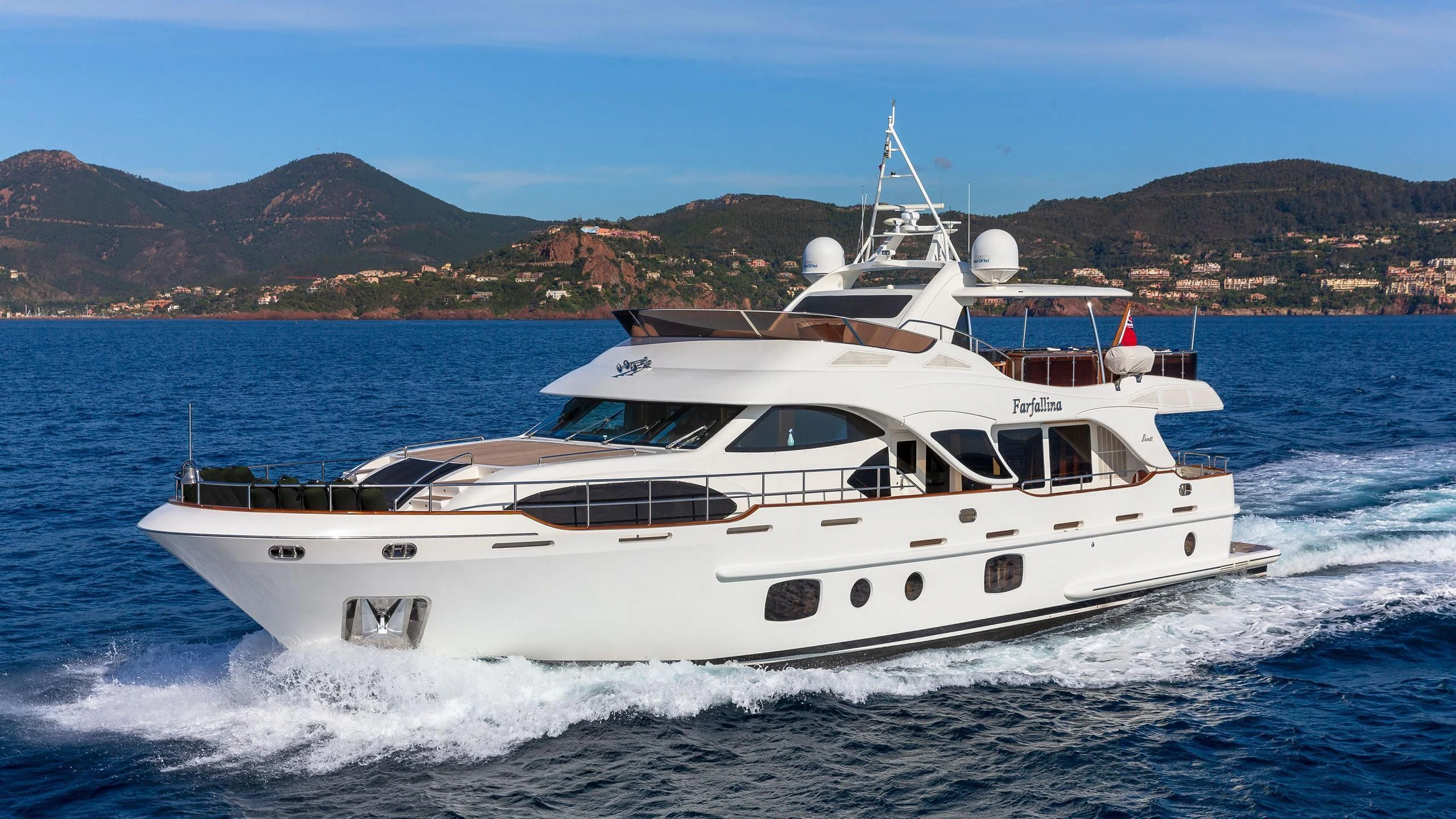 a white yacht on the water aboard FARFALLINA Yacht for Sale