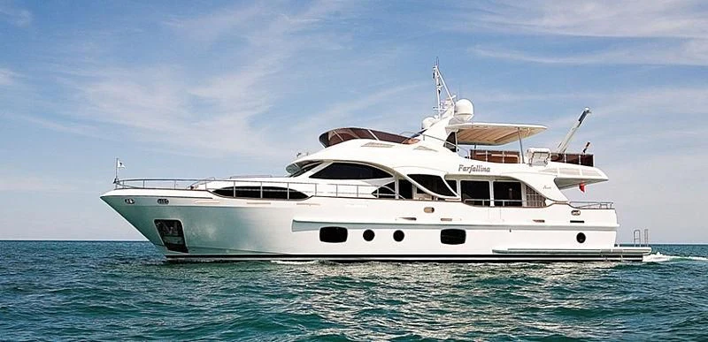 a white yacht in the water aboard FARFALLINA Yacht for Sale