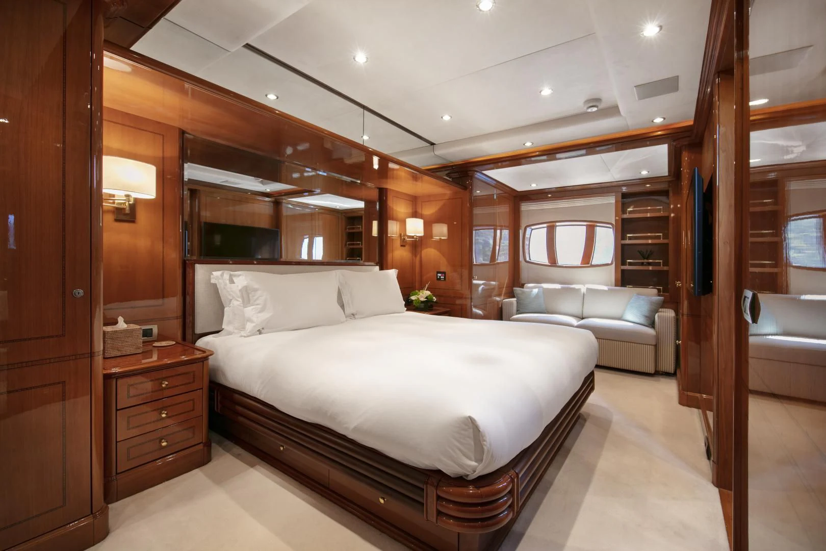 a large bed in a room aboard FARFALLINA Yacht for Sale