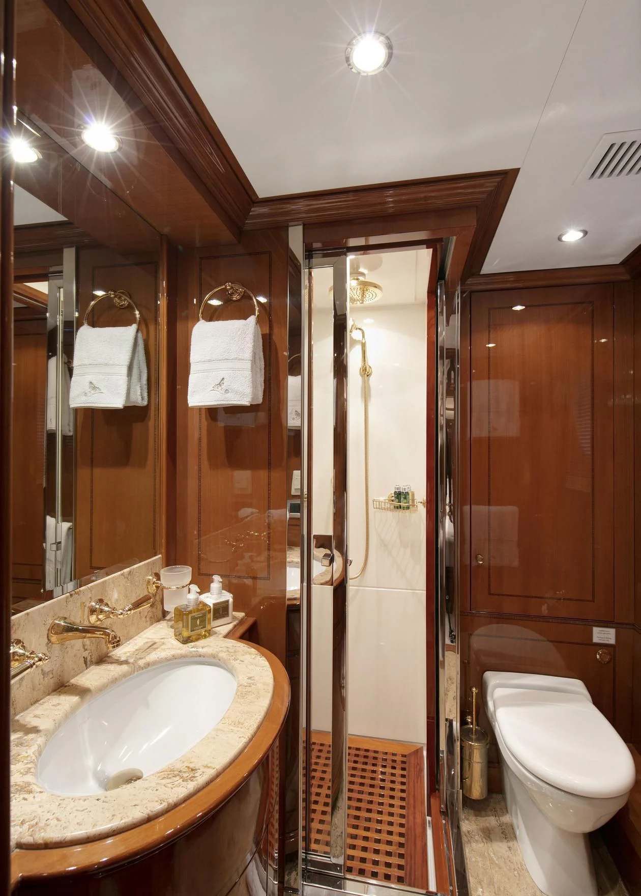 a bathroom with a sink and a shower aboard FARFALLINA Yacht for Sale
