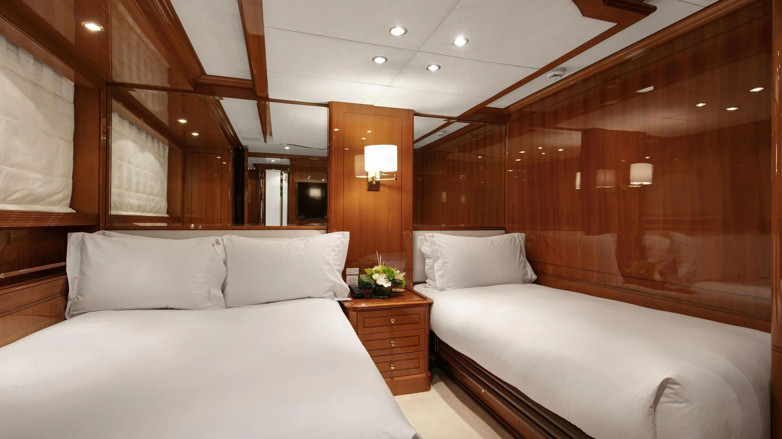 a room with two beds aboard FARFALLINA Yacht for Sale