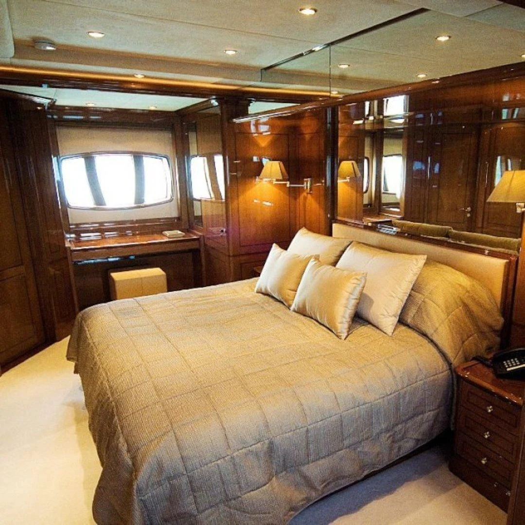 a bed in a room aboard FARFALLINA Yacht for Sale