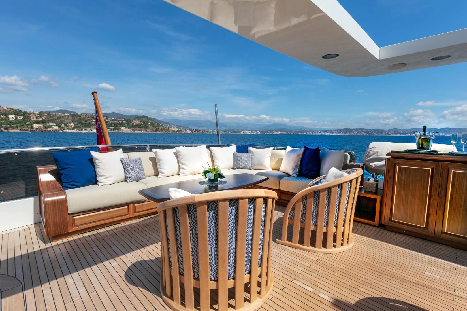 a large living room with a large patio and a large blue sky aboard FARFALLINA Yacht for Sale