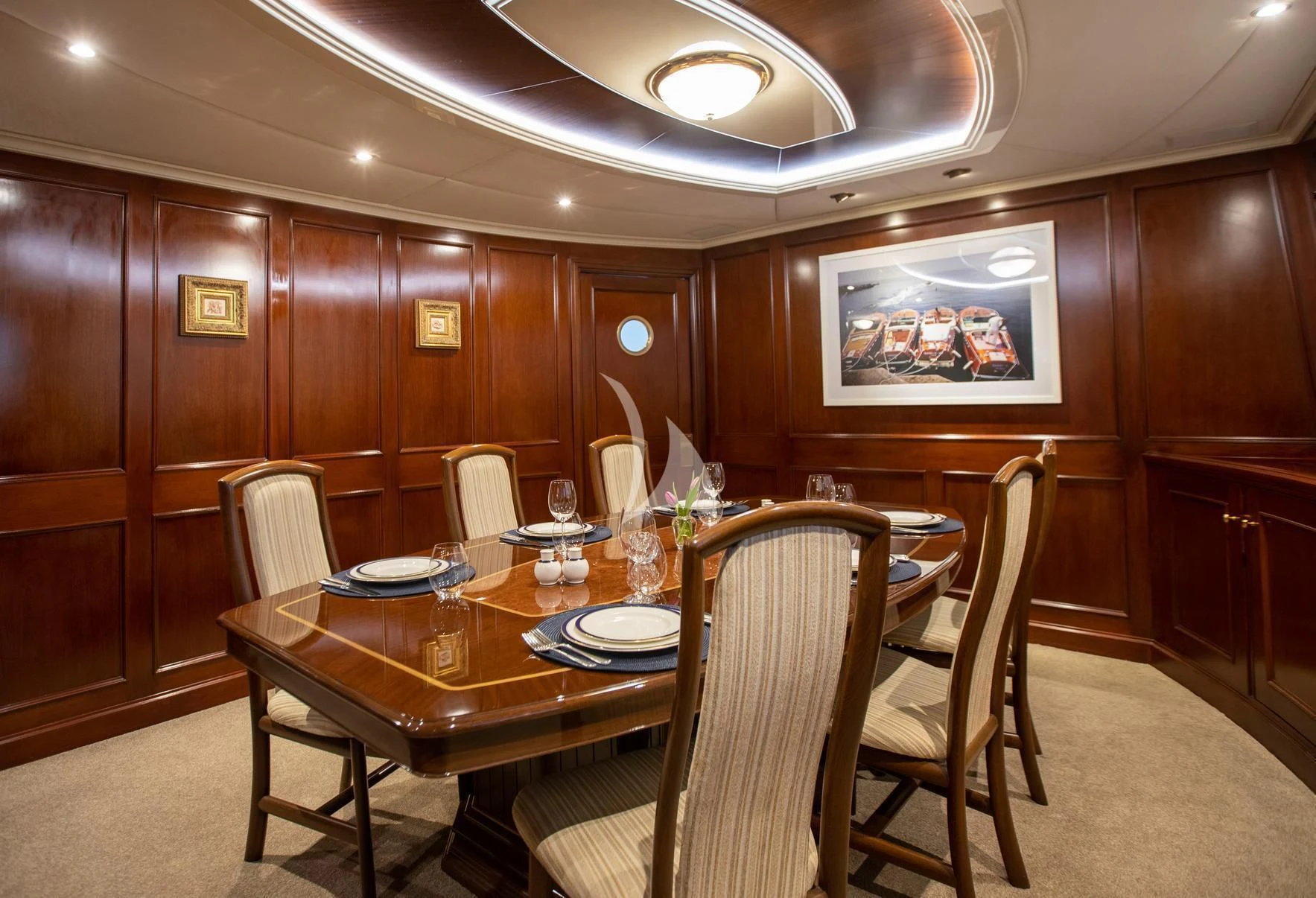 a dining table in a restaurant aboard PACIFIC MERMAID Yacht for Sale