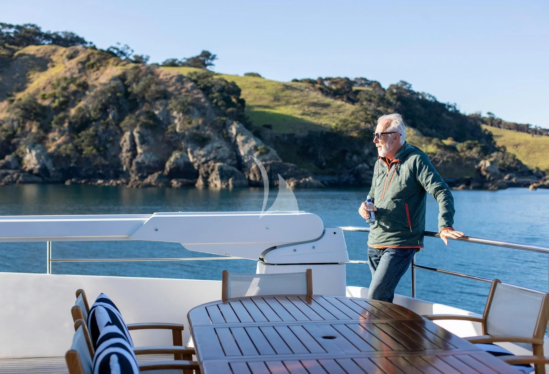 a person standing on a boat aboard PACIFIC MERMAID Yacht for Sale