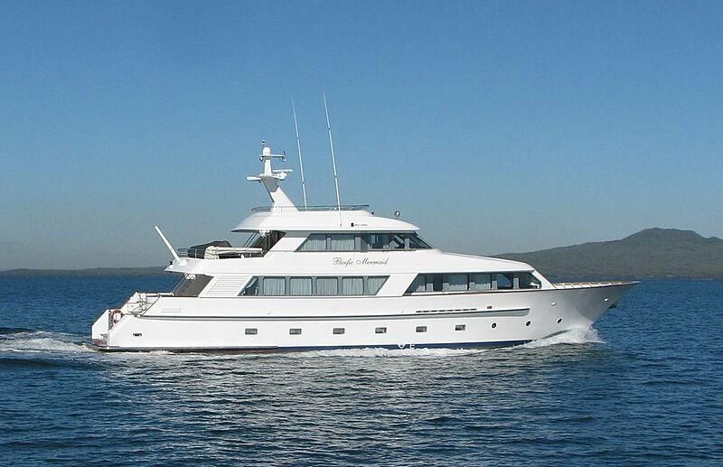 a white yacht on the water aboard PACIFIC MERMAID Yacht for Sale
