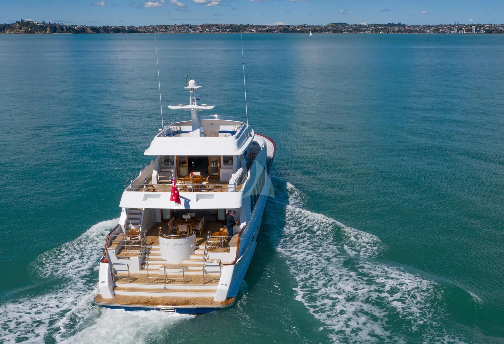 a boat on the water aboard PACIFIC MERMAID Yacht for Sale