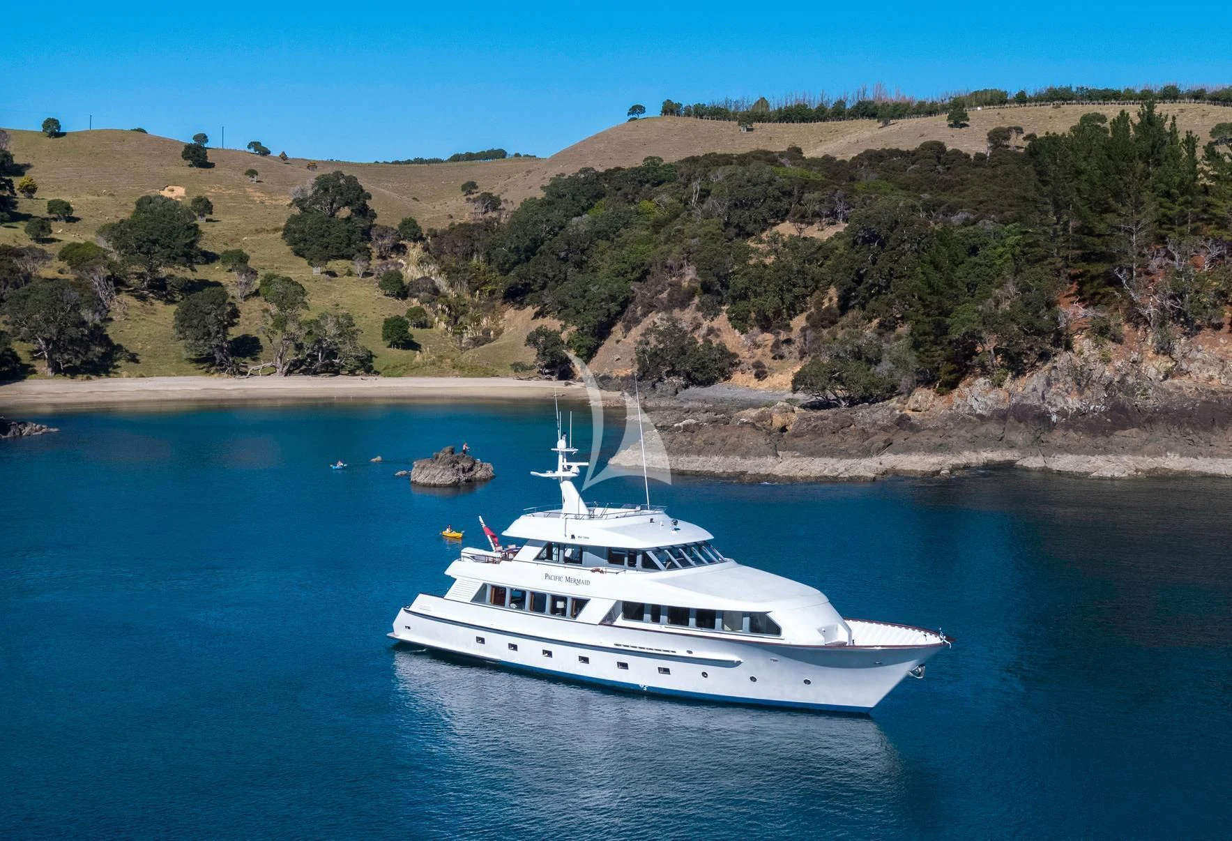a boat sailing on the water aboard PACIFIC MERMAID Yacht for Sale