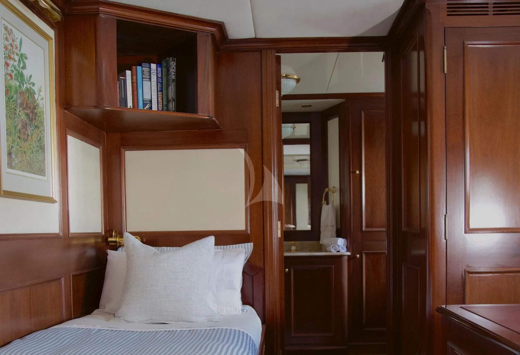 a bed in a room aboard PACIFIC MERMAID Yacht for Sale