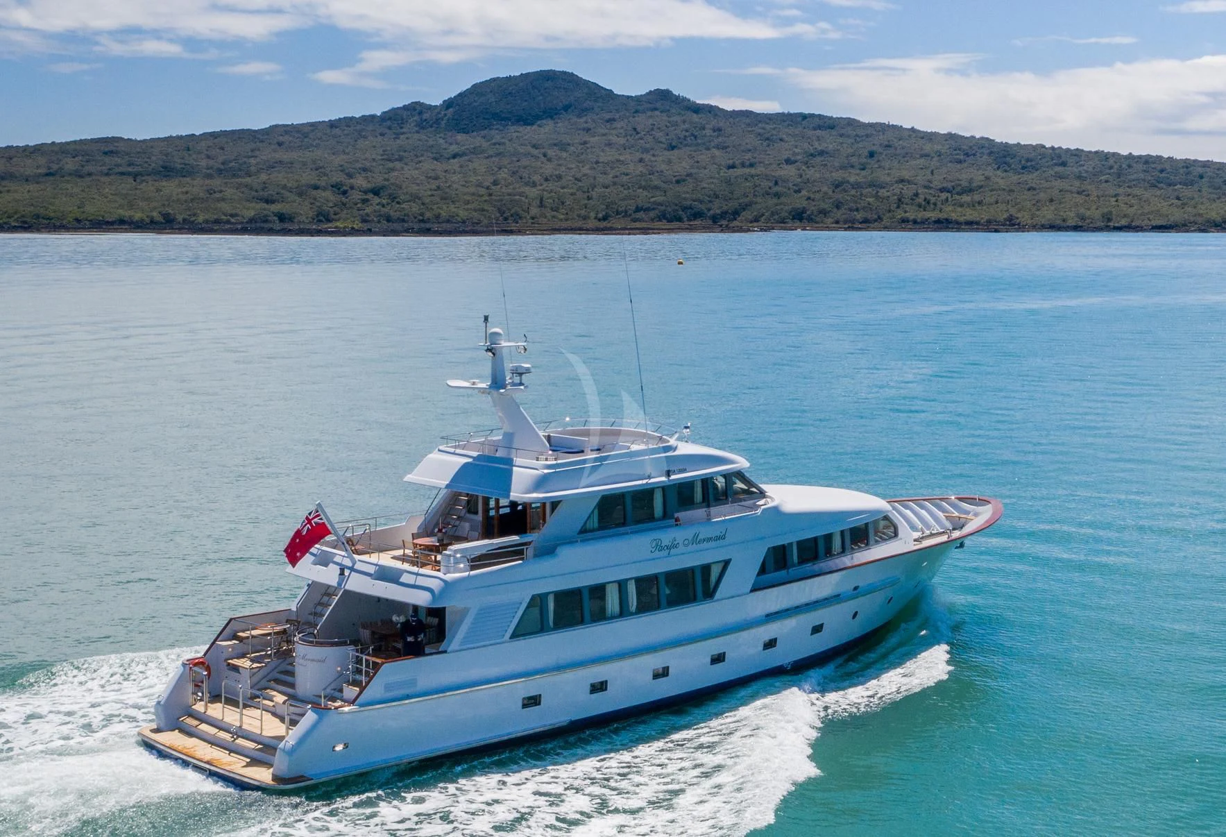 a boat on the water aboard PACIFIC MERMAID Yacht for Sale