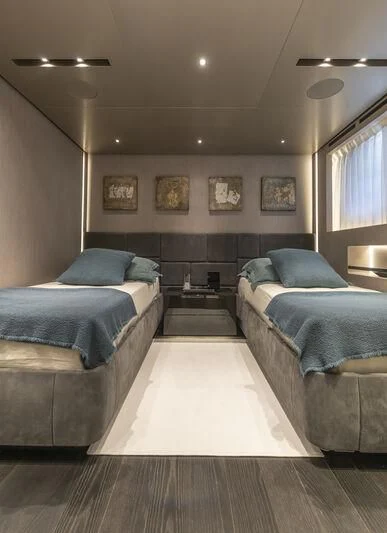 a room with two beds aboard RUSH Yacht for Sale
