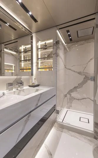 a bathroom with a large mirror aboard RUSH Yacht for Sale