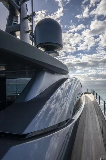 a boat with a satellite dish on the deck aboard RUSH Yacht for Sale