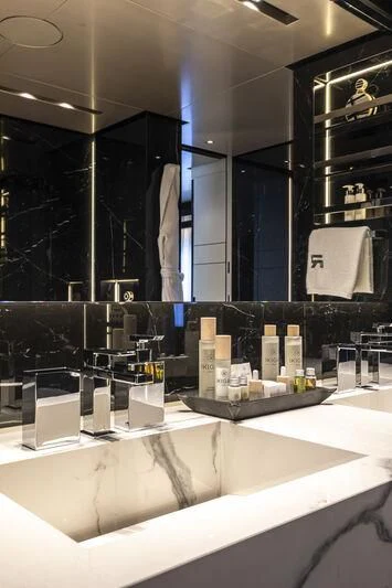 a bathroom with a large mirror aboard RUSH Yacht for Sale