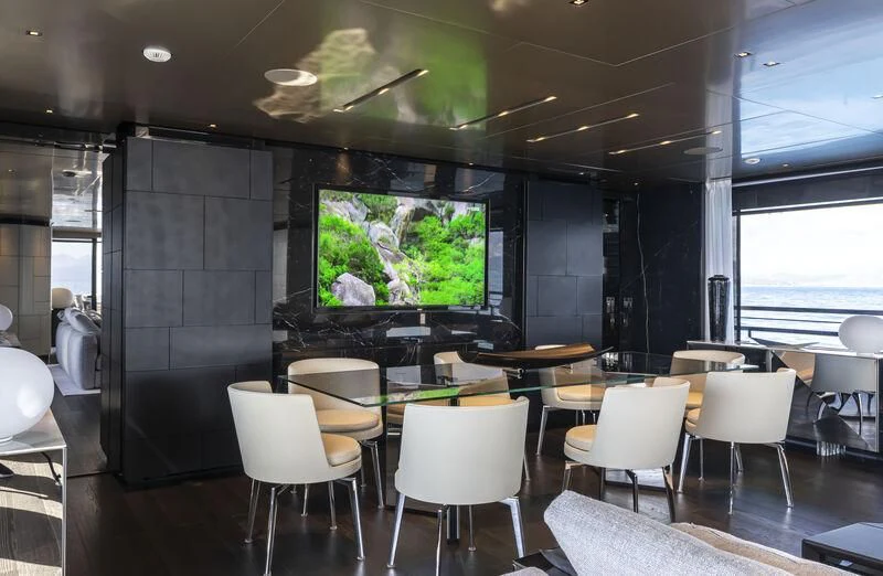 a room with a large screen aboard RUSH Yacht for Sale