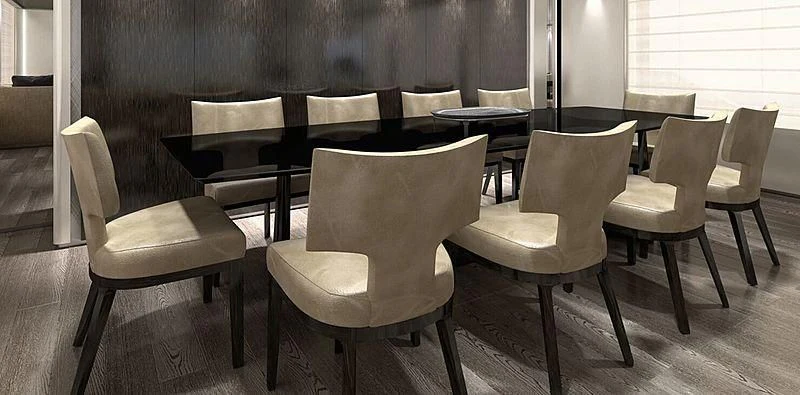a group of chairs around a table aboard RUSH Yacht for Sale