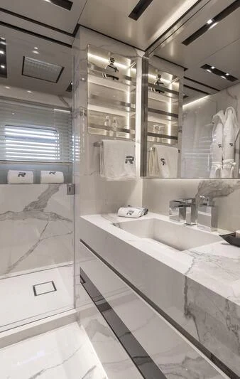 a bathroom with a sink and a mirror aboard RUSH Yacht for Sale