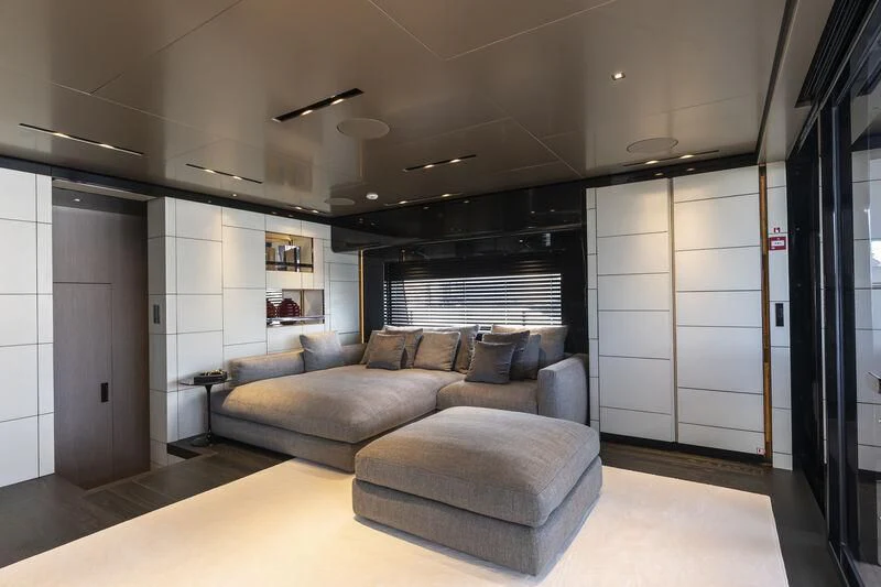 a room with a couch and a table aboard RUSH Yacht for Sale