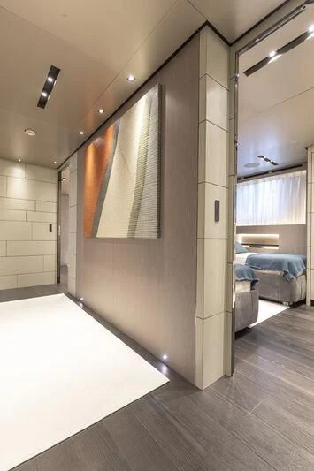 a room with a couch and a window aboard RUSH Yacht for Sale