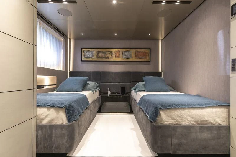a room with two beds aboard RUSH Yacht for Sale