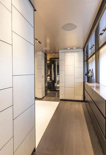 a hallway with a wood floor aboard RUSH Yacht for Sale