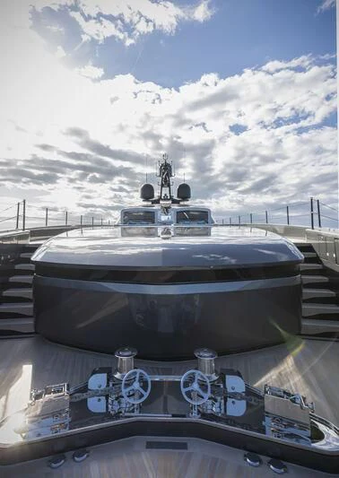 a large white boat on a dock aboard RUSH Yacht for Sale
