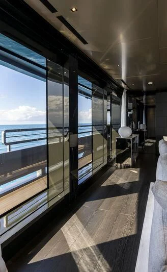 a room with a large glass door aboard RUSH Yacht for Sale