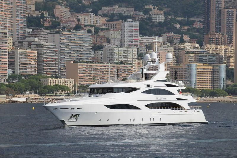 a white yacht in the water aboard WILD ORCHID I Yacht for Sale
