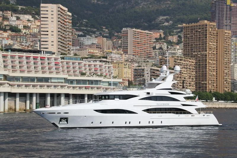 a white yacht in the water aboard WILD ORCHID I Yacht for Sale