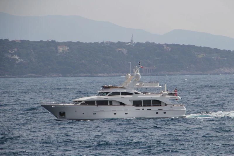 a white yacht in the water aboard SALUTE Yacht for Sale