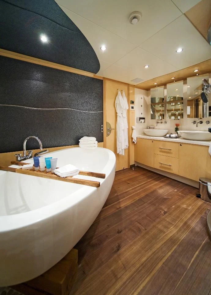 a bathroom with a large countertop aboard SALUTE Yacht for Sale