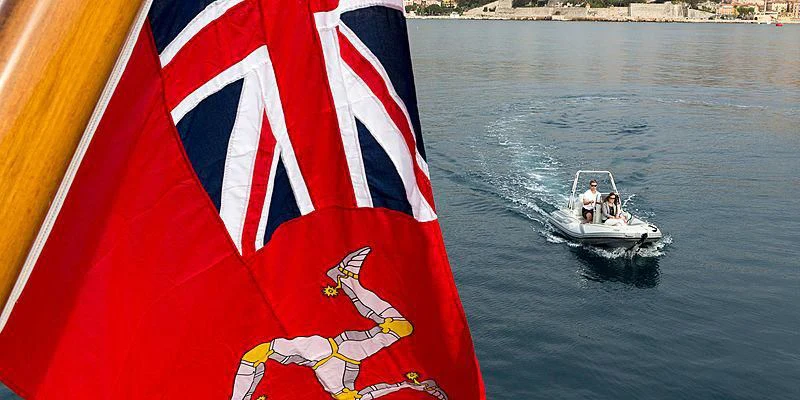 a boat sailing on the water aboard SALUTE Yacht for Sale