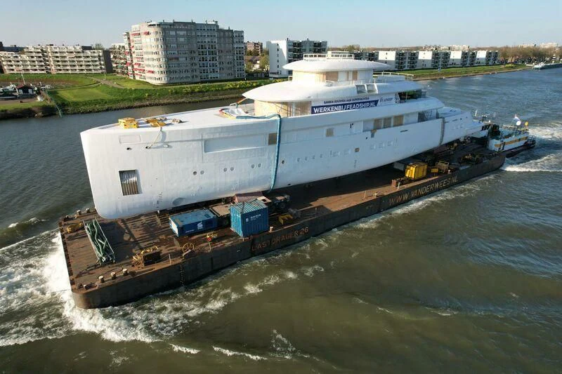 a large ship on the water aboard B Yacht for Sale