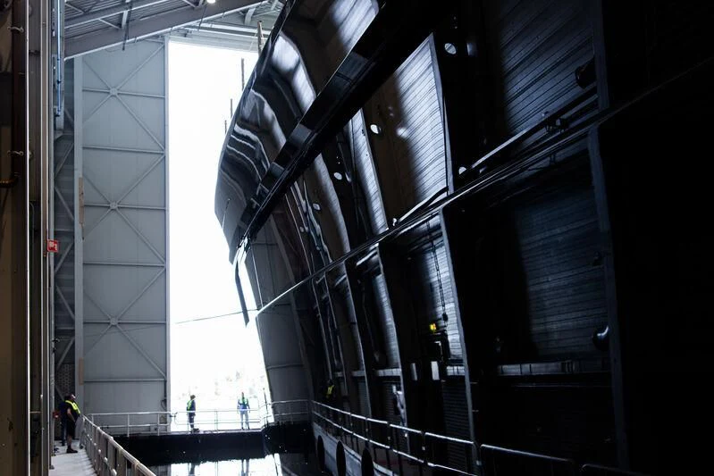 a large metal structure with a staircase aboard B Yacht for Sale
