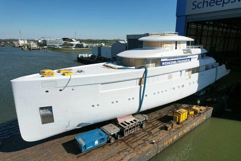 a large white boat aboard B Yacht for Sale