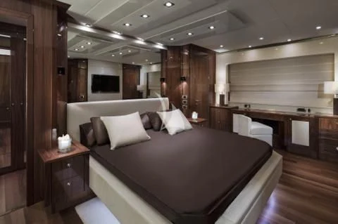 a bed in a room aboard PALUMBA Yacht for Sale