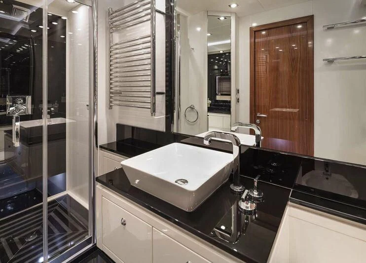 a bathroom with a large sink aboard PALUMBA Yacht for Sale