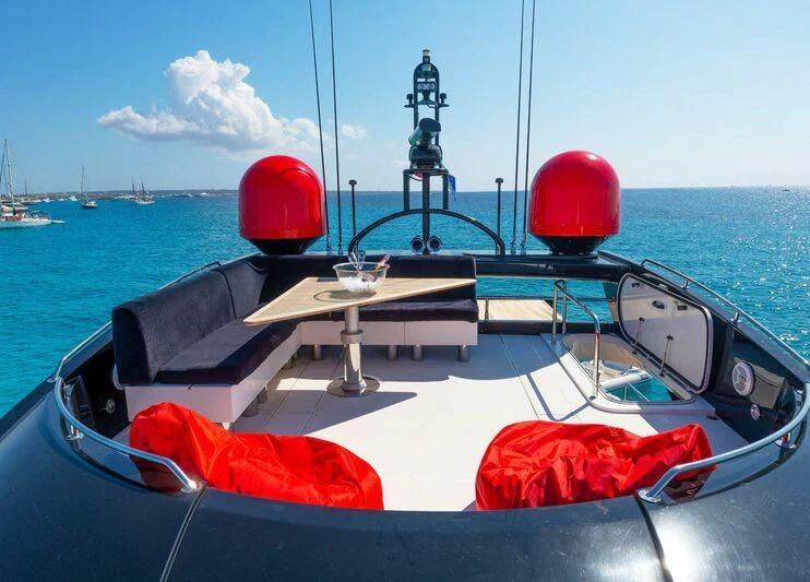 a boat with a red ball on the front aboard PALUMBA Yacht for Sale