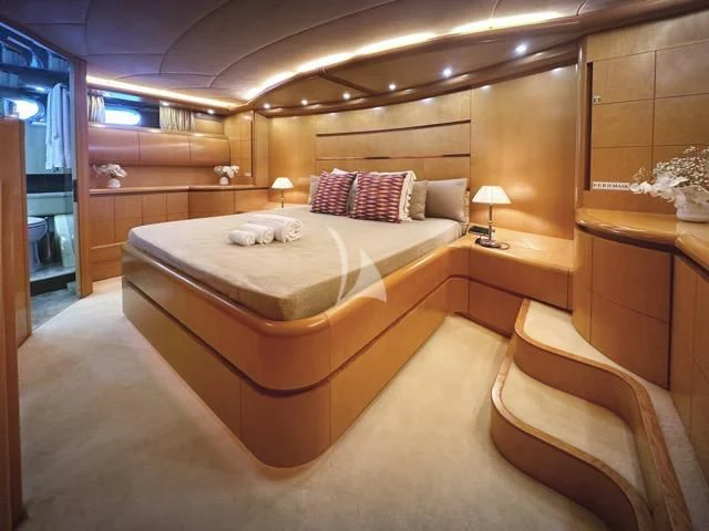 a bed in a room aboard LADY A Yacht for Charter