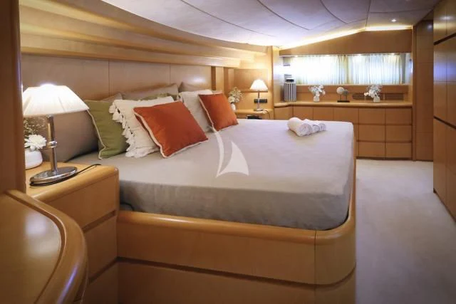 a bed with pillows and pillows aboard LADY A Yacht for Charter