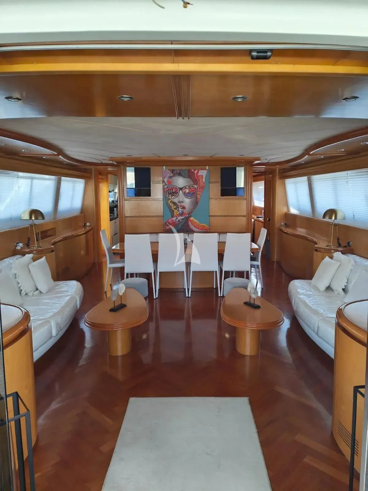 a train with a table and chairs aboard LADY A Yacht for Charter