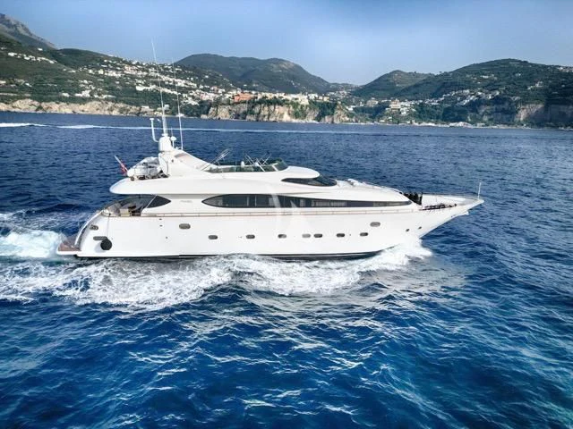 a white yacht on the water aboard LADY A Yacht for Charter
