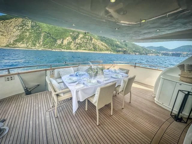a table set for a meal aboard LADY A Yacht for Charter