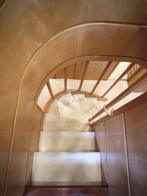 a staircase with a light aboard LADY A Yacht for Charter