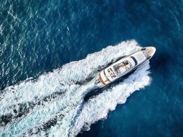 a silver watch on a body of water aboard LADY A Yacht for Charter
